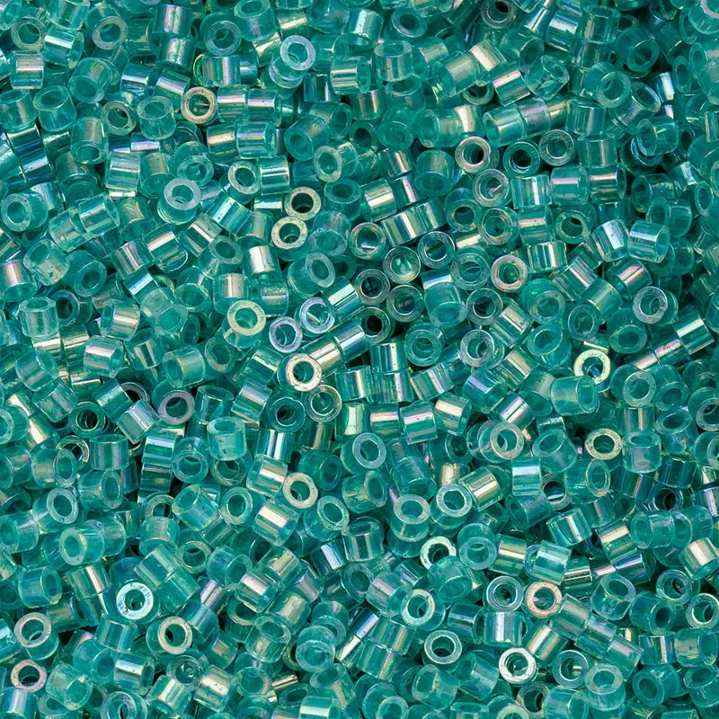 Cylin Bead 11/0 25g Bag Transparent Teal Caribbean AB