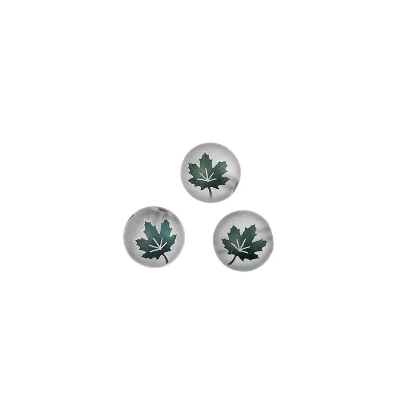 Glass Beads 7in Strand 10mm Round Matt Transparent Gray with Maple Leaf Pattern in Metallic Green